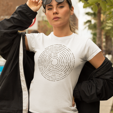 Load image into Gallery viewer, Person wearing a white t-shirt with 'a spiral text design, holding sunglasses.